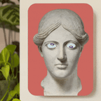 A colourful art clock made of a printed statue head on a rectangular background. The animated image flips through the four colour variations of the clock.